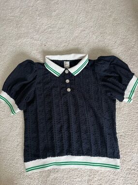 Maeve Navy Eyelet Polo with White Collar and Green Stripe